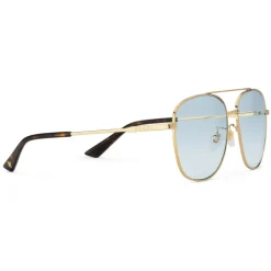 Gucci Eyewear Gucci - Navigator Sunglasses in Metal - Shiny Gold Lenses Blue - - Avvenice