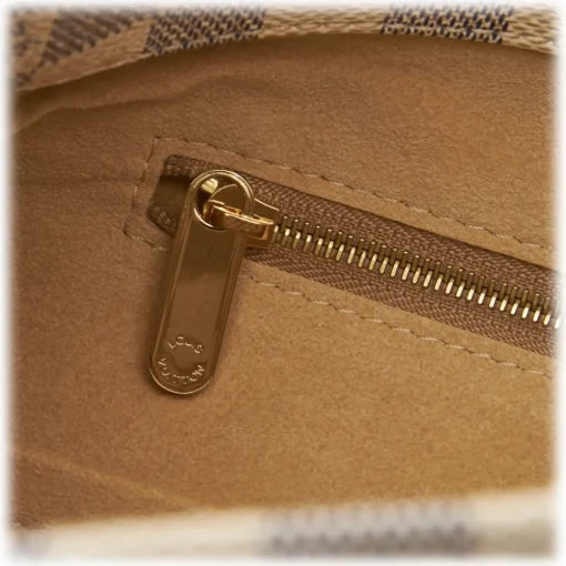 Louis Vuitton Vintage Vintage Bags-The Artsy MM features a damier azur canvas body, a rolled vachetta handle, an open top, and interior zip and slip pockets. - Avvenice