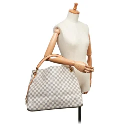 Louis Vuitton Vintage Vintage Bags-The Artsy MM features a damier azur canvas body, a rolled vachetta handle, an open top, and interior zip and slip pockets. - Avvenice